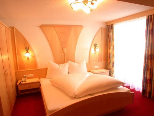 Imagen de la habitación del Hotel Garni Pradella. Foto 19