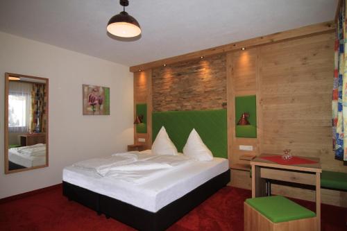 Imagen de la habitación del Hotel Garni Pradella. Foto 20