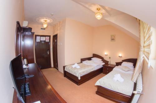 Imagen de la habitación del Hotel Garni Royal Crown. Foto 7