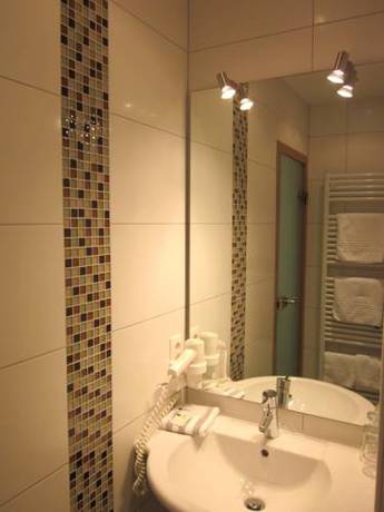 Imagen de la habitación del Hotel Garni Sch&uuml;tzenhof. Foto 16