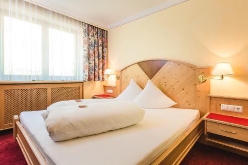 Imagen de la habitación del Hotel Garni Tirol. Foto 8