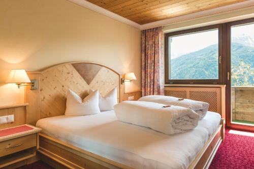 Imagen de la habitación del Hotel Garni Tirol. Foto 9