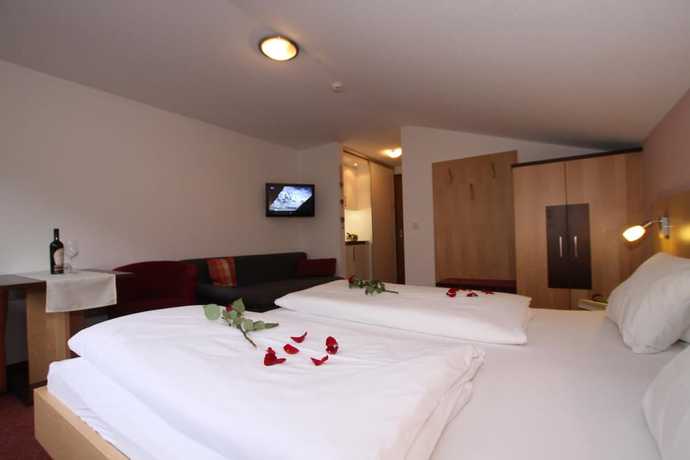 Imagen de la habitación del Hotel Garni Tirol. Foto 9