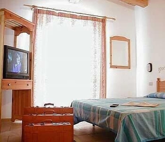 Imagen de la habitación del Hotel Garni Tosca. Foto 10