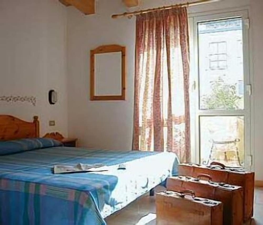 Imagen de la habitación del Hotel Garni Tosca. Foto 11