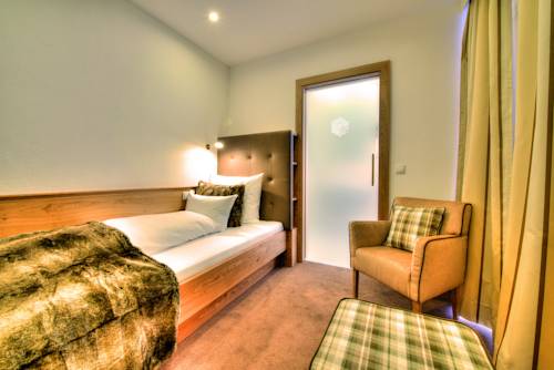 Imagen de la habitación del Hotel Garni Urezza. Foto 10