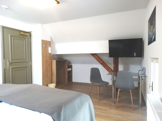 Imagen de la habitación del Hotel Garni Villa Areka. Foto 2