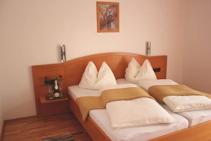 Imagen de la habitación del Hotel Garni Villa Tamara. Foto 10