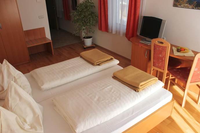 Imagen de la habitación del Hotel Garni Villa Tamara. Foto 13