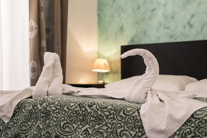 Imagen de la habitación del Hotel Garni Virgo. Foto 2