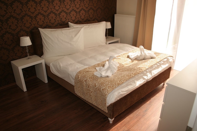 Imagen de la habitación del Hotel Garni Virgo. Foto 5