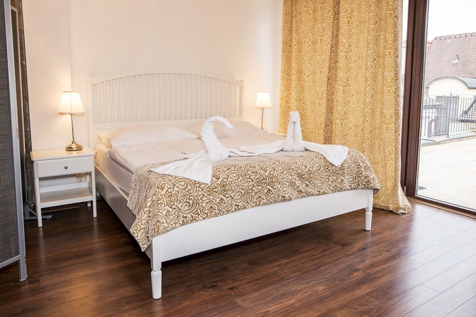 Imagen de la habitación del Hotel Garni Virgo. Foto 8