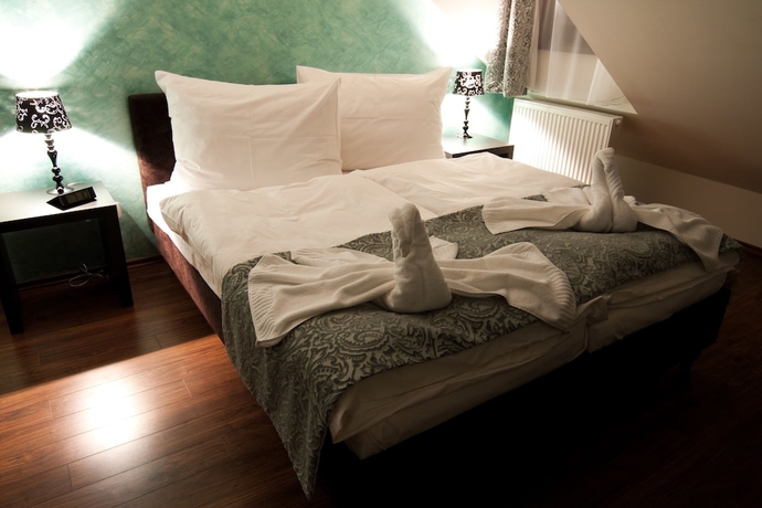 Imagen de la habitación del Hotel Garni Virgo. Foto 10