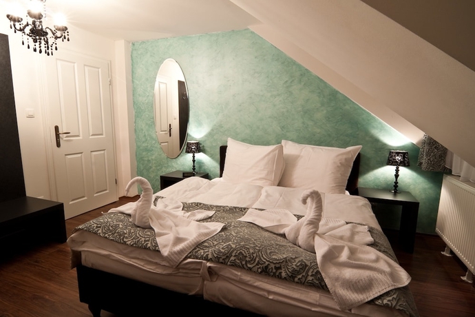 Imagen de la habitación del Hotel Garni Virgo. Foto 12