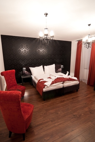 Imagen de la habitación del Hotel Garni Virgo. Foto 14