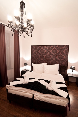 Imagen de la habitación del Hotel Garni Virgo. Foto 15