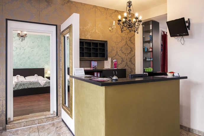 Imagen de la habitación del Hotel Garni Virgo. Foto 17