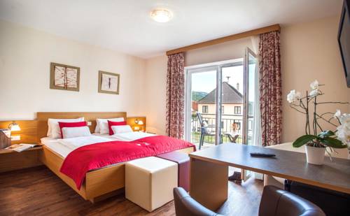 Imagen de la habitación del Hotel Garni Weinquadrat. Foto 6