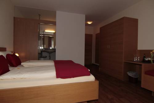 Imagen de la habitación del Hotel Garni Weinquadrat. Foto 13