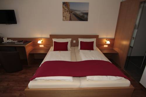 Imagen de la habitación del Hotel Garni Weinquadrat. Foto 14