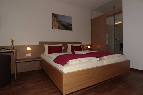 Imagen de la habitación del Hotel Garni Weinquadrat. Foto 15