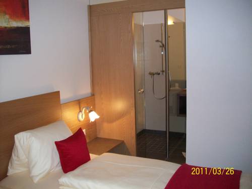 Imagen de la habitación del Hotel Garni Weinquadrat. Foto 16