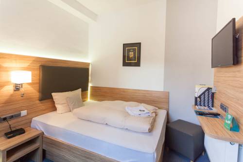 Imagen de la habitación del Hotel Garni Zur Alten Post. Foto 7
