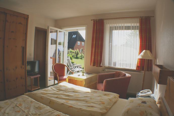 Imagen de la habitación del Hotel Garni Zur Post, Utersum. Foto 13