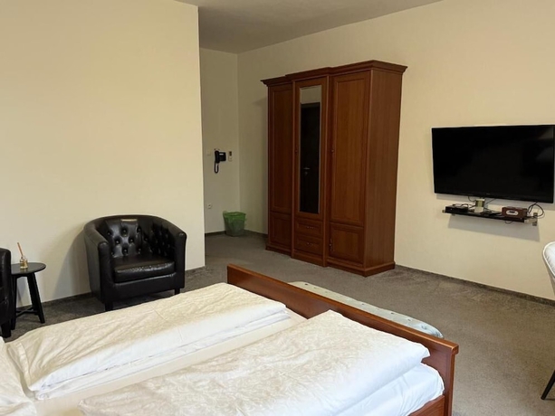 Imagen de la habitación del Hotel Garni and Boutique Saint Michael. Foto 11