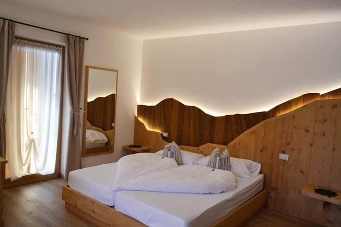 Imagen de la habitación del Hotel Garni and Wellness Anderle. Foto 3