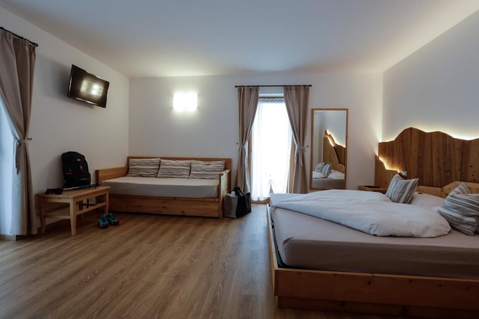Imagen de la habitación del Hotel Garni and Wellness Anderle. Foto 8