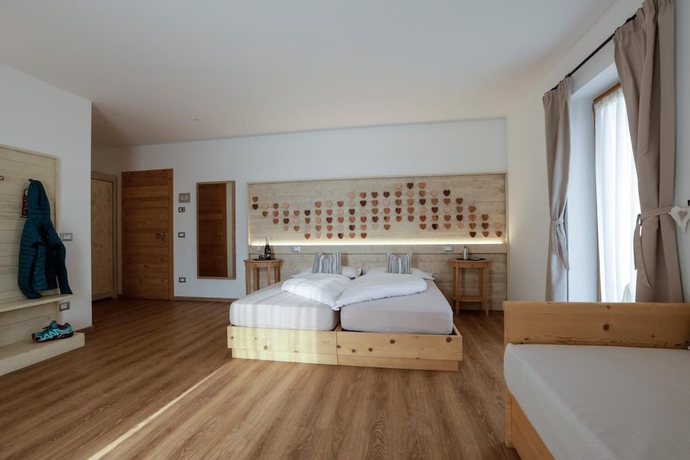 Imagen de la habitación del Hotel Garni and Wellness Anderle. Foto 11