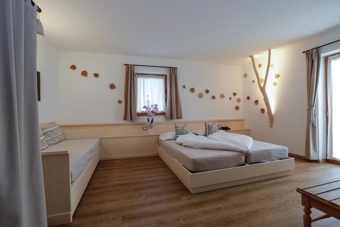 Imagen de la habitación del Hotel Garni and Wellness Anderle. Foto 12