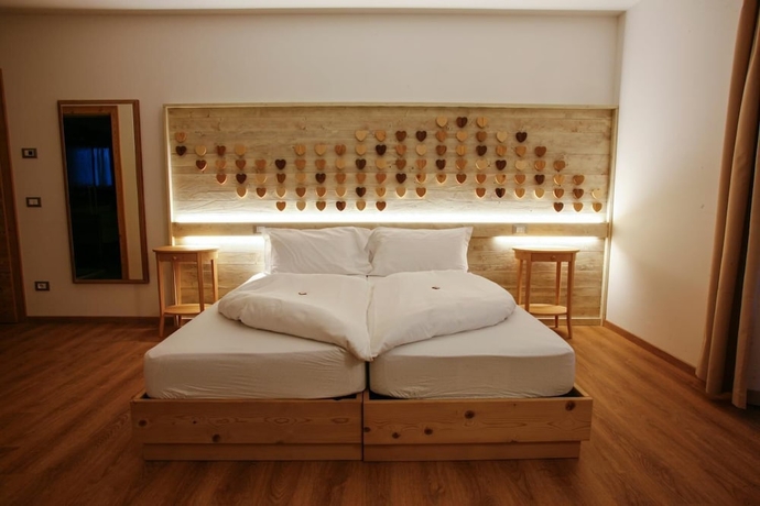Imagen de la habitación del Hotel Garni and Wellness Anderle. Foto 14