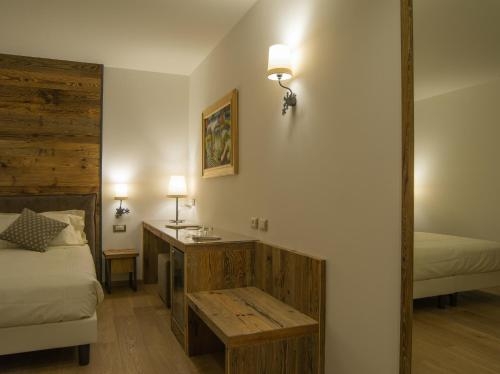 Imagen de la habitación del Hotel Garn&igrave; Caminetto. Foto 6