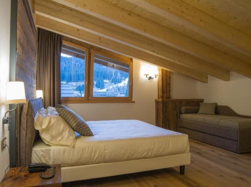 Imagen de la habitación del Hotel Garn&igrave; Caminetto. Foto 7