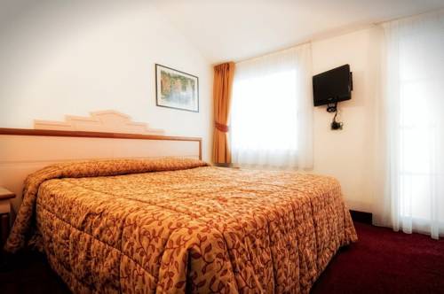 Imagen de la habitación del Hotel Garnì Villa Fontana. Foto 7