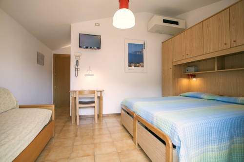 Imagen de la habitación del Hotel Garnì Villa Magnolia. Foto 4