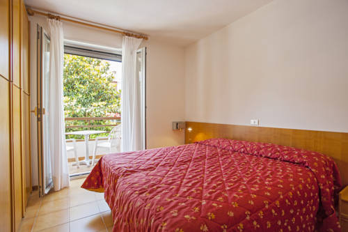 Imagen de la habitación del Hotel Garnì Villa Magnolia. Foto 8