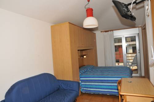 Imagen de la habitación del Hotel Garnì Villa Magnolia. Foto 13