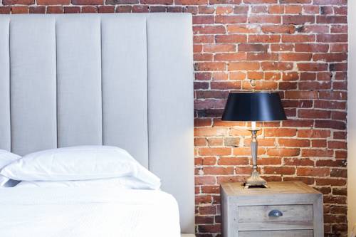 Imagen de la habitación del Hotel Garrison Inn Boutique. Foto 3