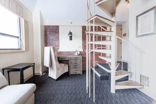 Imagen de la habitación del Hotel Garrison Inn Boutique. Foto 8