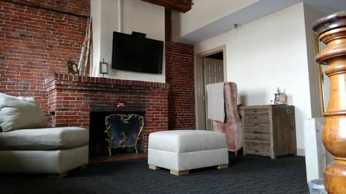 Imagen de la habitación del Hotel Garrison Inn Boutique. Foto 9