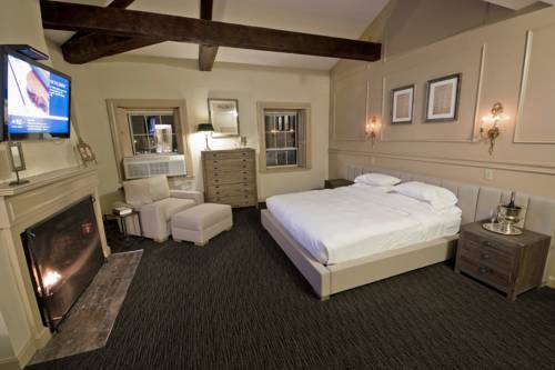 Imagen de la habitación del Hotel Garrison Inn Boutique. Foto 10