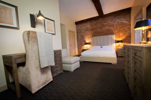 Imagen de la habitación del Hotel Garrison Inn Boutique. Foto 11