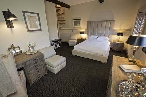 Imagen de la habitación del Hotel Garrison Inn Boutique. Foto 15