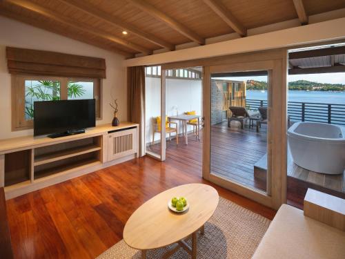 Imagen de la habitación del Hotel Garrya Tongsai Bay Samui. Foto 13