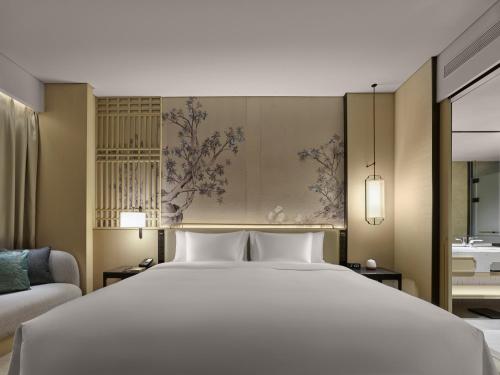 Imagen de la habitación del Hotel Garrya Yangcheng Lake. Foto 12