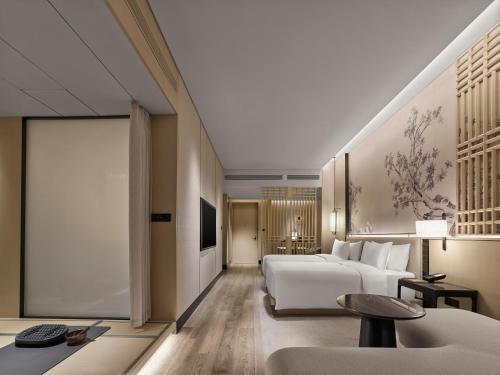 Imagen de la habitación del Hotel Garrya Yangcheng Lake. Foto 13