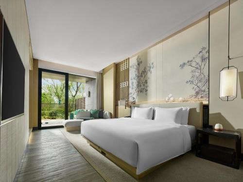 Imagen de la habitación del Hotel Garrya Yangcheng Lake. Foto 18